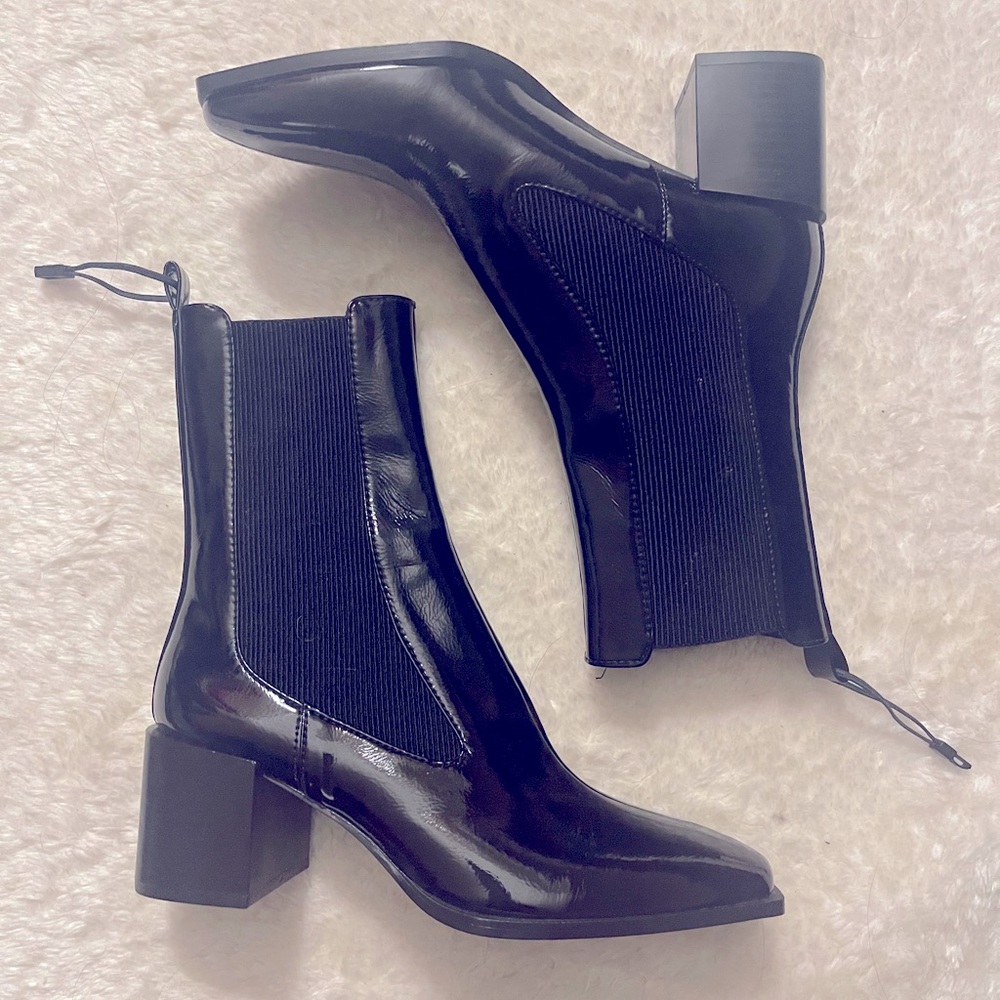 Black patent wide heeled stretch ankle boots.